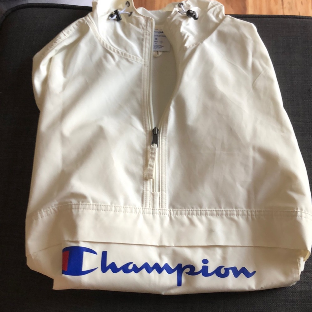 Off white colored champion windbreaker
